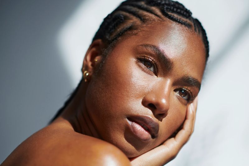 Gorgeous Black woman with glowing skin